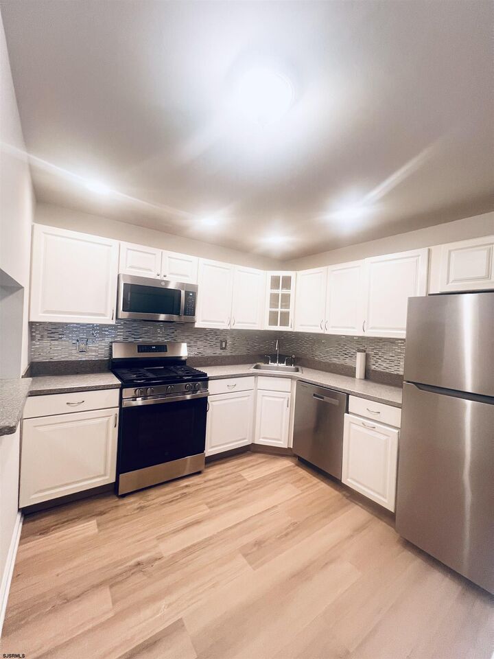 Property Photo:  24 Federal Ct 24  NJ 08205 