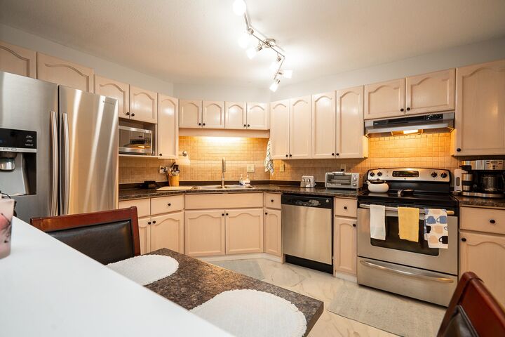 Property Photo: 2410 Emerson Street 105 BC V2T 3J3