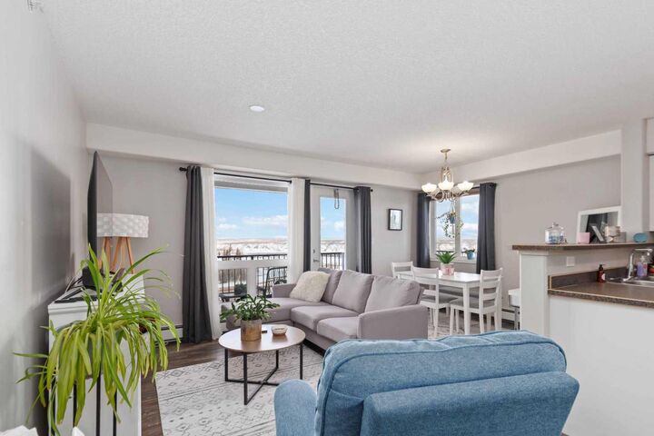 Property Photo: 248A Grosbeak Way 412 AB T9K 0W1