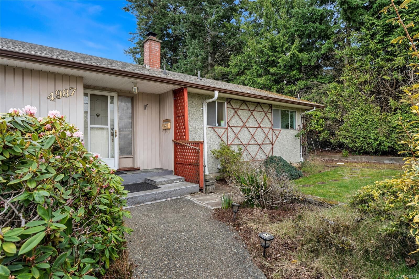 Property Photo:  4987 Wesley Rd  BC V8Y 1Z1 