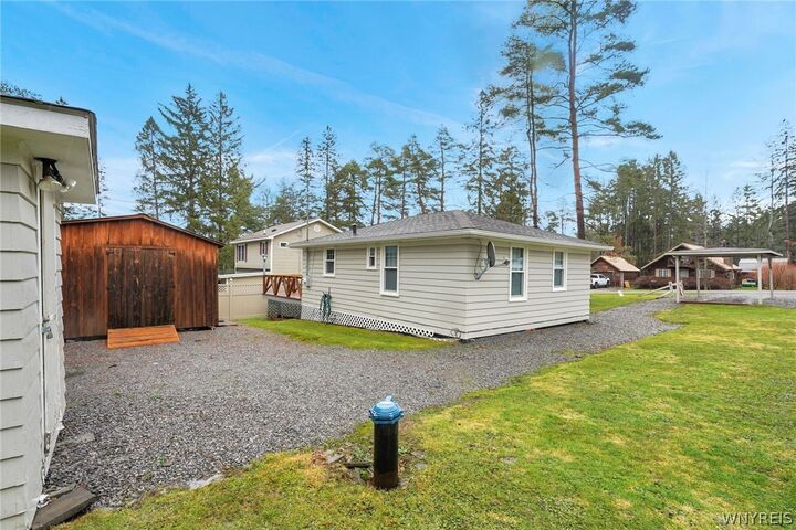 Property Photo:  8142 Elmwood Drive  NY 14717 