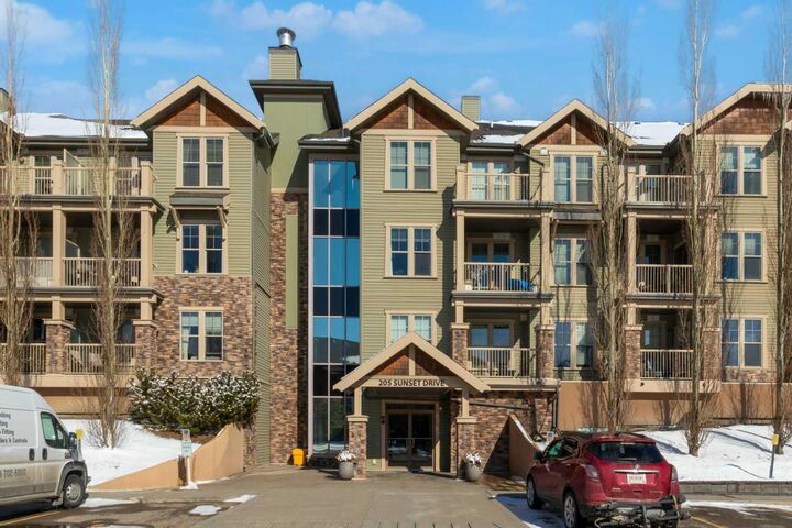 Property Photo: 205 Sunset Drive SW 303 AB T4C 0H6