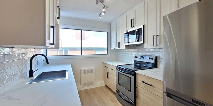 Property Photo:  2400 15 Street SW 29  AB T2T 5S3 
