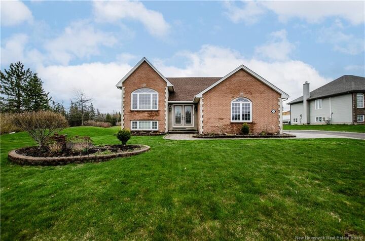 Property Photo: 717 Royal Oaks Boulevard NB E1H 3N8