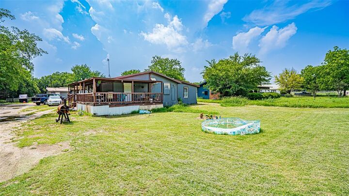 Property Photo:  291 County Road 4858  TX 76071 