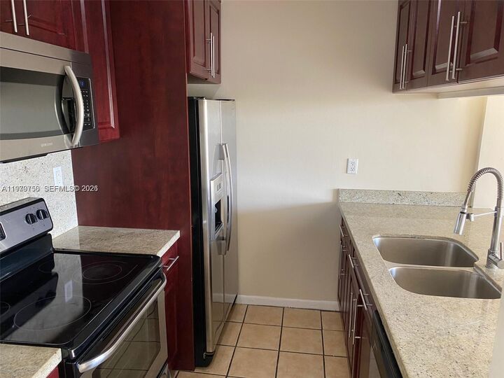Property Photo:  8002 SW 149th Ave B409  FL 33193 