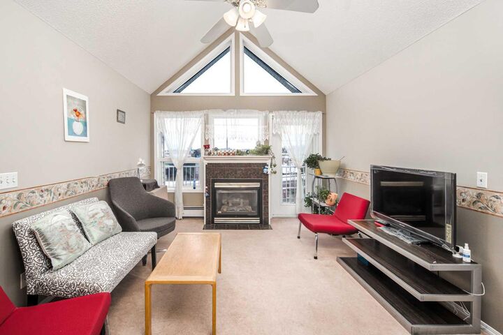 Property Photo: 7 Harvest Gold Manor NE 313 AB T3K 4Y3