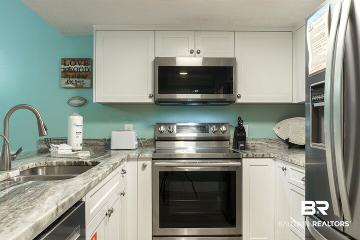 Property Photo:  1003 West Beach Boulevard 702  AL 36542 
