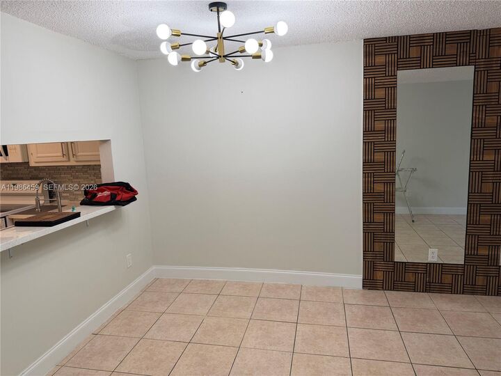 Property Photo:  13685 NE 10th Ave 210  FL 33161 