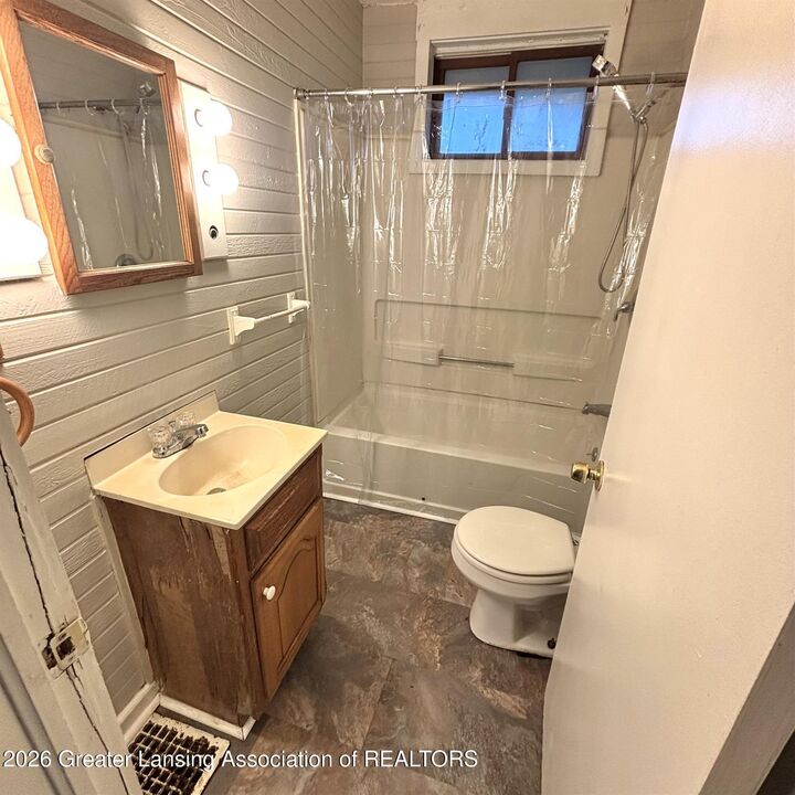 Property Photo:  411 S Hayford Avenue  MI 48912 