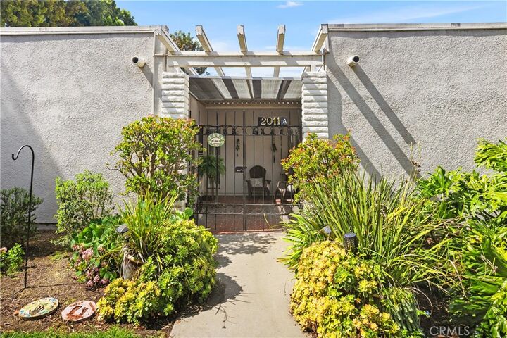 Property Photo:  2011 Via Mariposa West A  CA 92637 