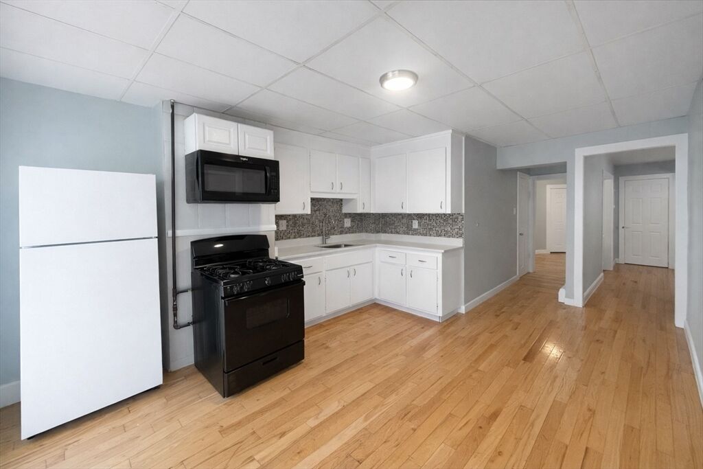 Property Photo:  203 London St 1  MA 02128 