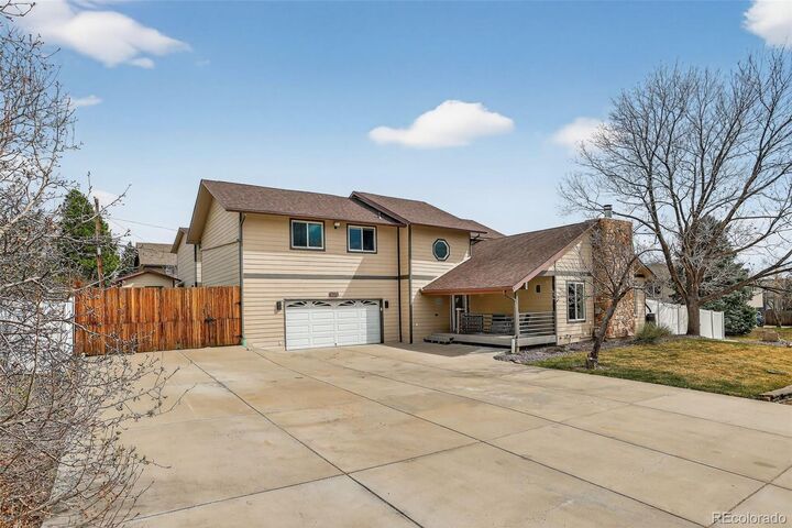 Property Photo:  8226 S Dover Street  CO 80128 