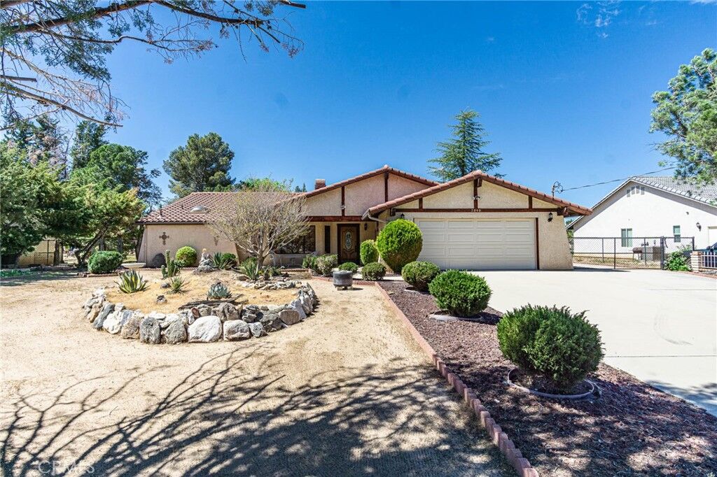 Property Photo:  7040 Kenyon Avenue  CA 92345 