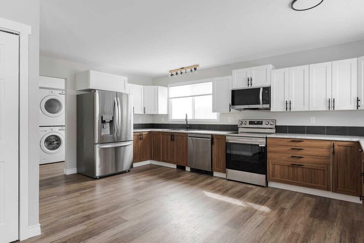 Property Photo:  209 Woodland Drive  AB T9K 1A4 