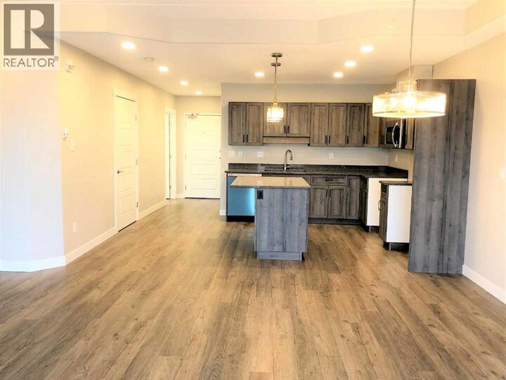 Property Photo: 499 Meadow Lake Court East AB T1R 0Y7