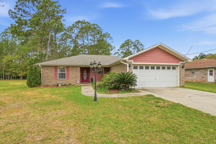 Property Photo:  4237 Melton Road  FL 32583 