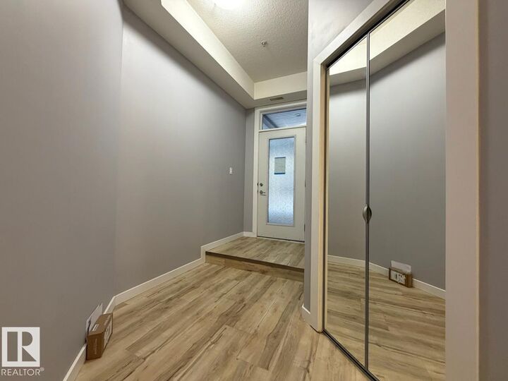 Property Photo: 10531 117 Street NW 128 AB T5H 0A8