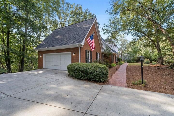 Property Photo:  8705 River Bluff Lane  GA 30076 