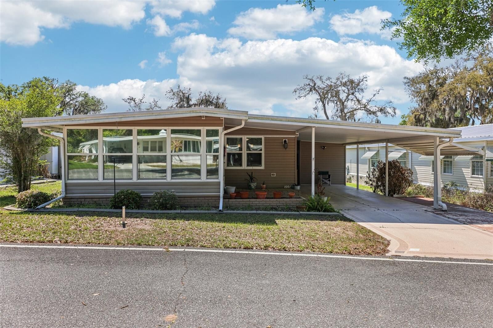 Property Photo: 105 Orchid Way FL 34748