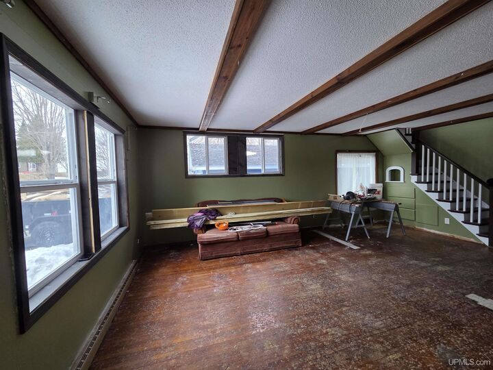 Property Photo:  210 Blossom Street  MI 49935 