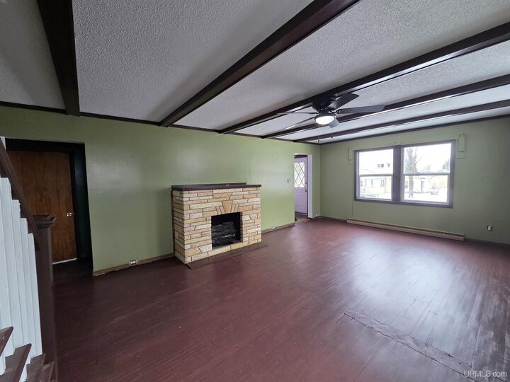 Property Photo:  210 Blossom Street  MI 49935 
