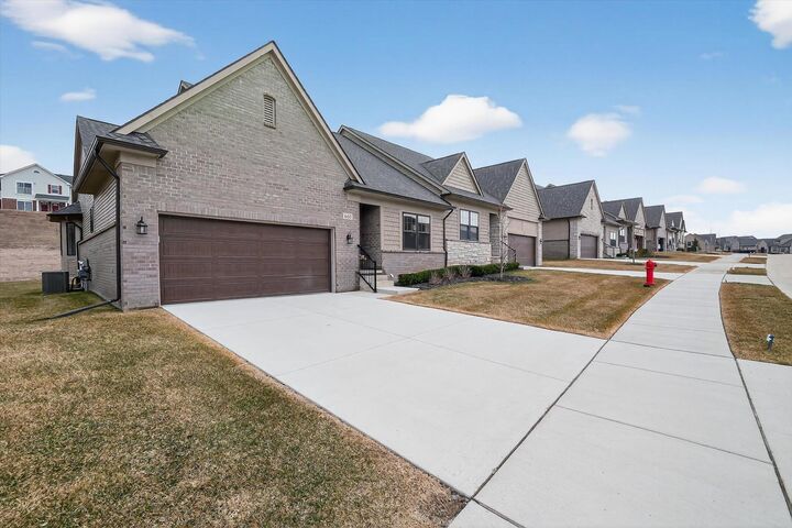 Property Photo: 660 Brookstone Drive MI 48371