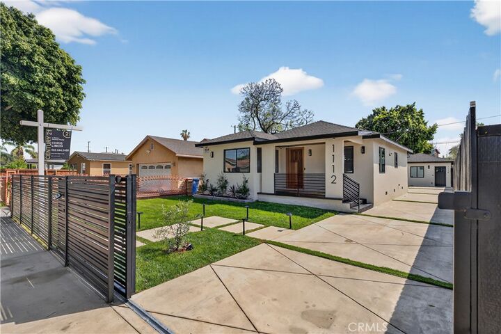 Property Photo:  1112 E 102nd Street  CA 90002 