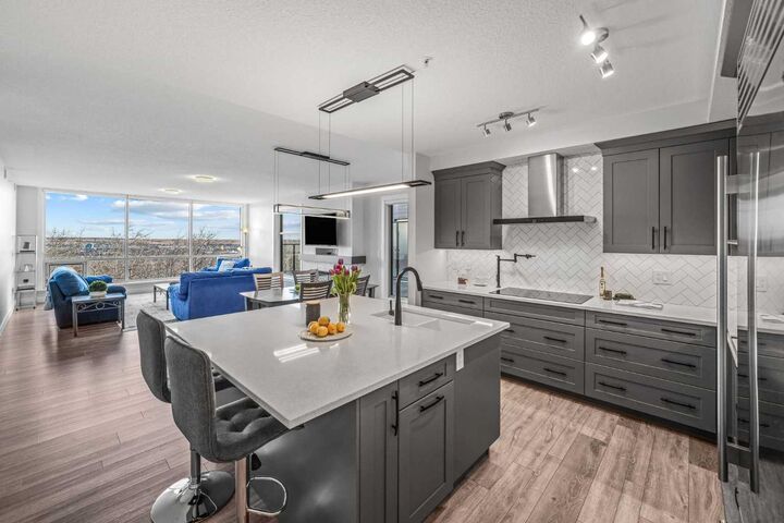 Property Photo:  15 Cougar Ridge Landing SW 108  AB T3H 6C3 