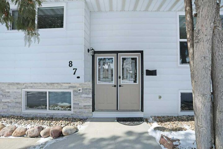 Property Photo:  87 Dr. Anderson Park Street E  AB T1R 0K5 