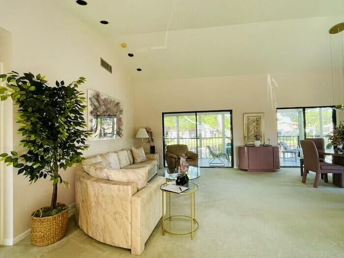 Property Photo:  10656 Tropic Palm Avenue 202  FL 33437 