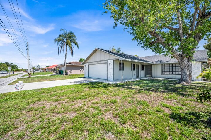 Property Photo:  2621 SE Westmoreland Boulevard  FL 34952 