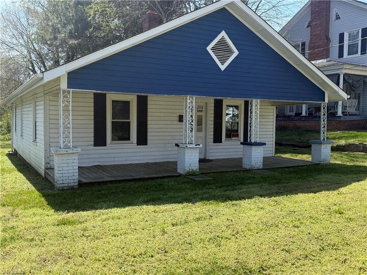 Property Photo:  213 W Decatur Street  NC 27025 
