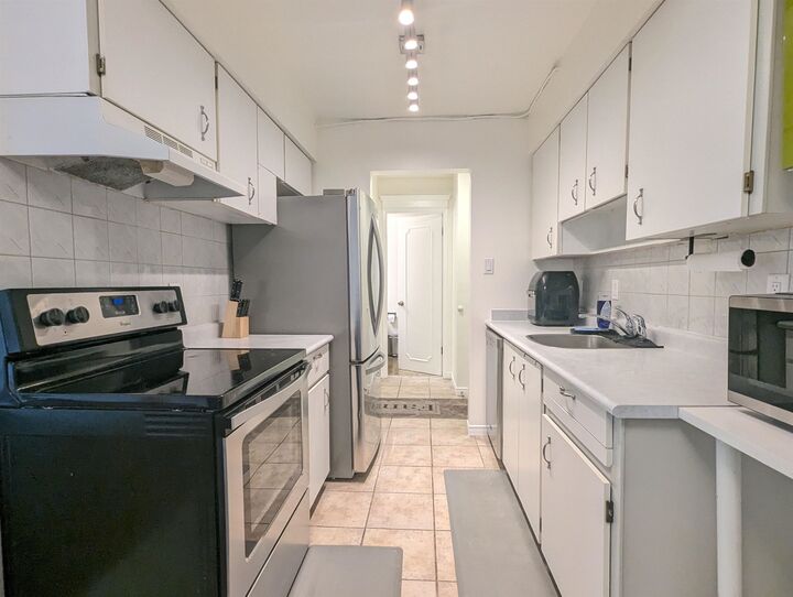Property Photo: 7428 19th Avenue 308 BC V3N 1E1