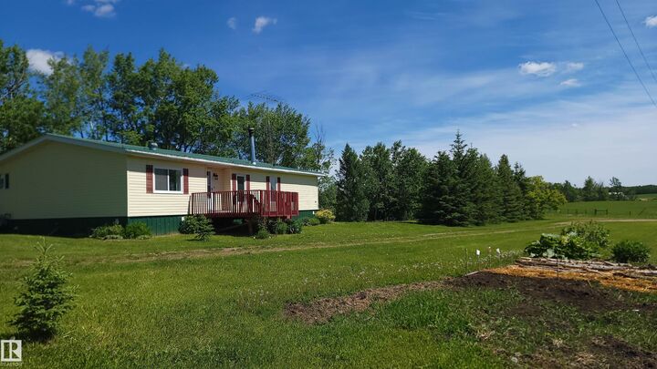 Property Photo: 55418 Range Road 70 AB T0W 2A0