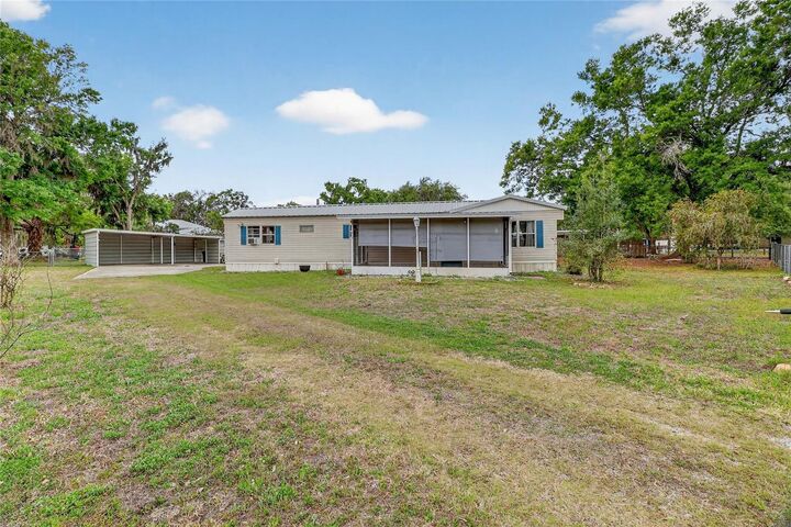 Property Photo:  4710 Village Drive  FL 33811 