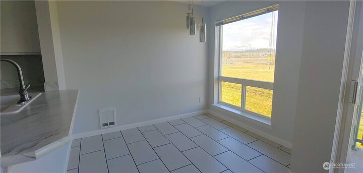 Property Photo: 9735 272nd Street NW 511 WA 98292