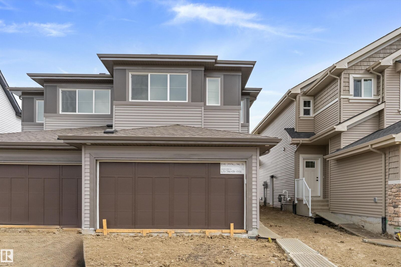 Property Photo: 1048 Cristall Crescent SW AB T6W 5S6