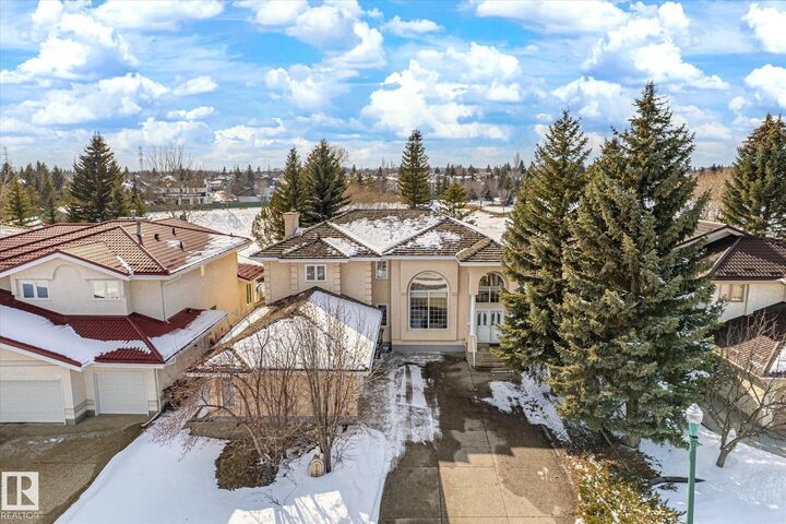 Property Photo: 128 Weaver Drive NW AB T6H 2J3