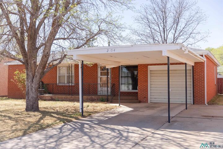 Property Photo:  204 Acoma Drive  NM 88101 