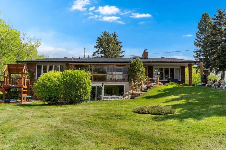 Property Photo:  24157 Meadow Drive  AB T3R 1A8 