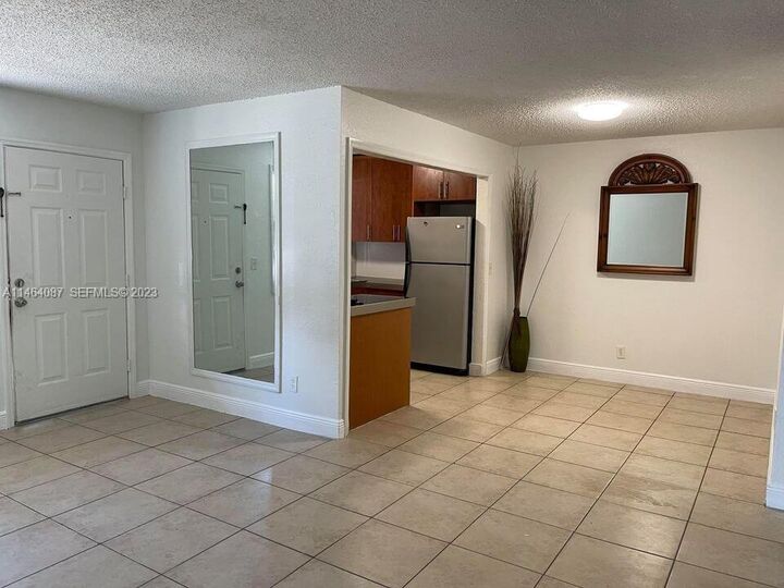 Property Photo:  400 NW 65th Avenue 114  FL 33063 