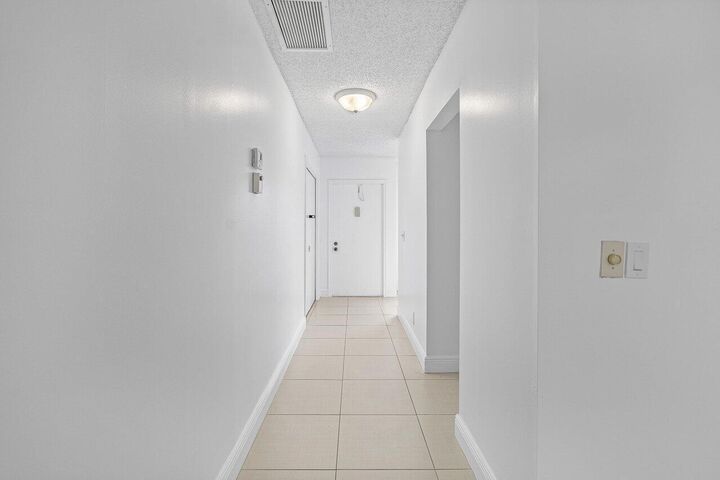 Property Photo:  1021 Flame Vine Avenue  FL 33445 