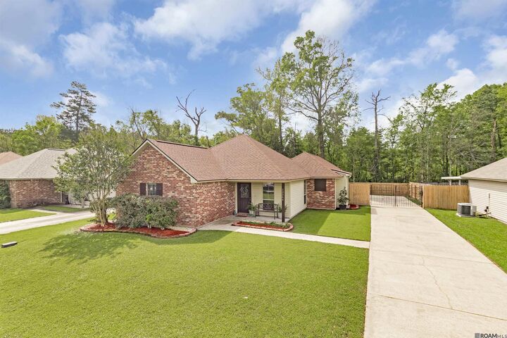 Property Photo:  12266 Creekside Ave  LA 70785 