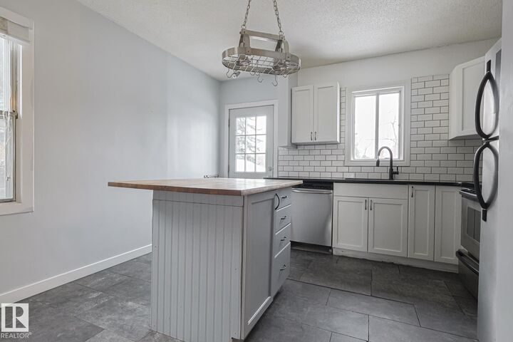 Photo de la propriété: 13519 107A Avenue NW AB T5M 2A6