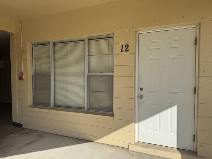Property Photo:  2040 World Parkway Boulevard 12  FL 33763 