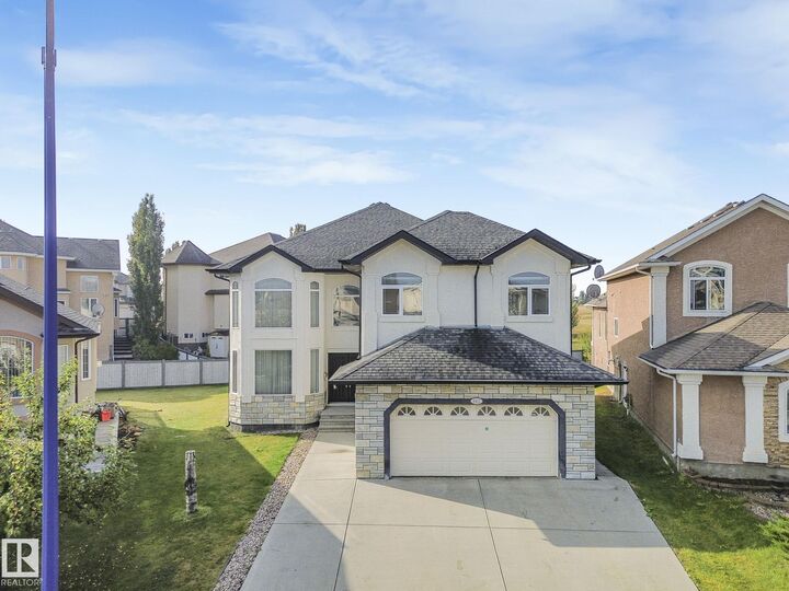 Property Photo:  6911 17 Avenue SW  AB T6X 0C9 