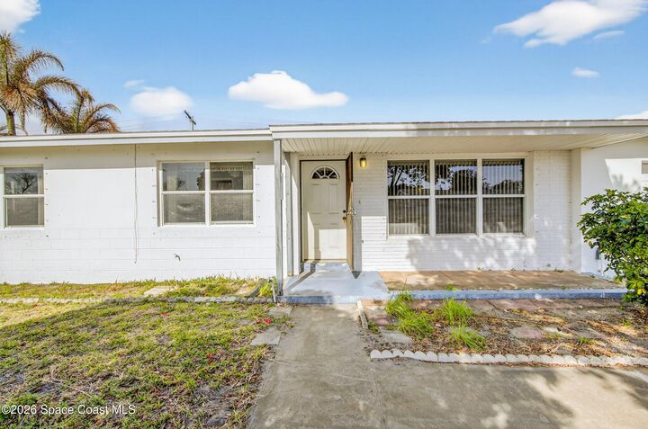 Property Photo:  205 Melaleuca Drive  FL 32937 