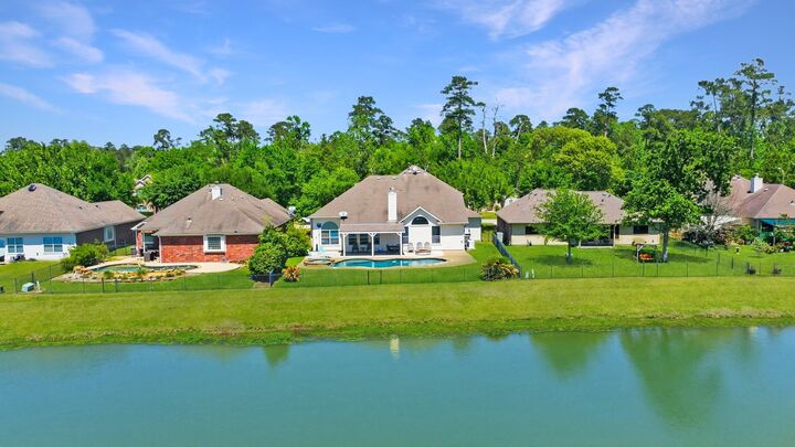 Property Photo: 9203 E Lakeside Drive TX 77354