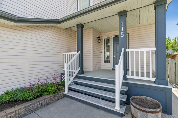 Property Photo: 115 Cove Crescent AB T1X 1J5